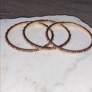 3 purple/goldtoned stoned bangles.